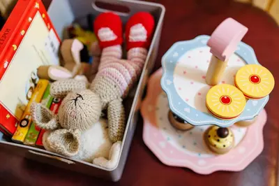 a lunch box filled with toys on a table at Spacious Cabin EVCharger and free Parking near Cambridge in Cambridge