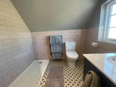 a bathroom with a toilet and a sink at Cathedral View Apartment, Flat 4 in Bury Saint Edmunds