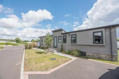 a modular home with a driveway at Marshwiggle, Aldeburgh in Aldeburgh