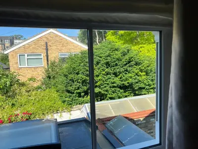 a window with a view of a house at 300m to Fitzwilliam museum 3 en-suites double bedroom Victoria house in Cambridge