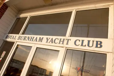 a building with a sign on the front of it at The Royal Burnham Yacht Club in Burnham on Crouch