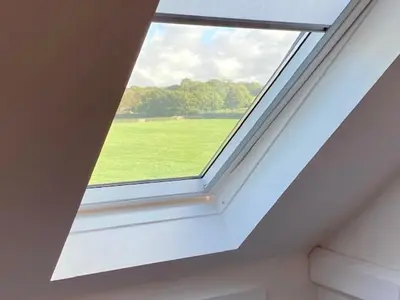 a skylight window in a room with a green field at 72 Ashley Road in Newmarket