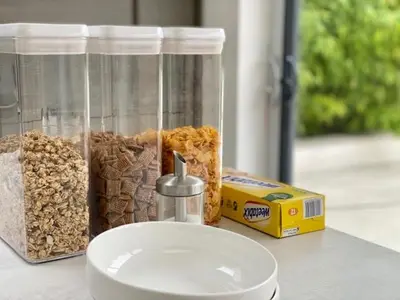 a counter with two containers of food and a box of cereal at 72 Ashley Road in Newmarket
