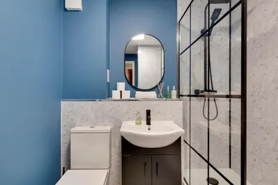 a bathroom with a sink and a mirror at Pass the Keys Renovated Sunny Home Pass the Keys in Cambridge
