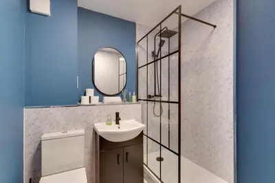 a bathroom with a sink and a mirror at Pass the Keys Renovated Sunny Home Pass the Keys in Cambridge