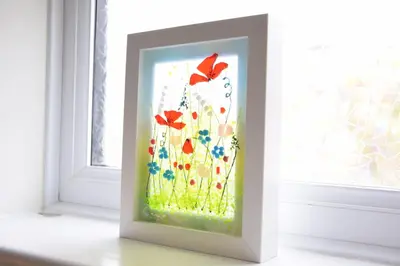 a picture of butterflies in a window at 1 Tailors Cottage, Woodbridge in Woodbridge