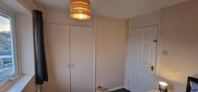 a room with a white cabinet and a light at Shirley L, Milton, Cambridge, 4 BR House, Newly Refurbished in Milton