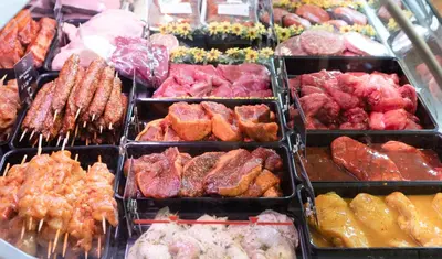 a display of different types of meats and other foods at Vine Cottage in Walsham le Willows