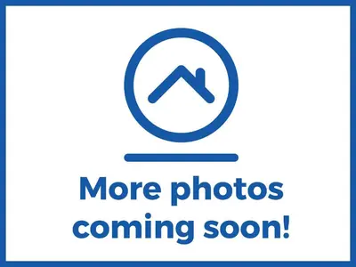 a sign that says more photos coming soon at 160 Exning Road in Newmarket