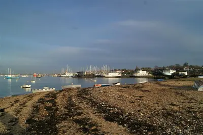 a group of boats docked in a harbor at Secluded Island Retreat - in the heart of the Anchorage in West Mersea