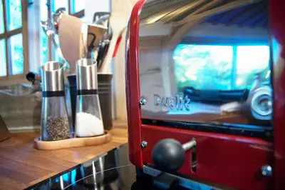a kitchen counter with a red food processor with spices at Chobbs Barn, Eye in Eye