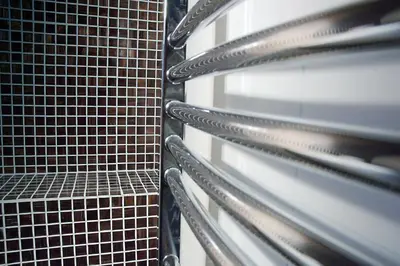 a metal refrigerator with its door open in a room at Chobbs Barn, Eye in Eye