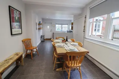 a dining room with a table and chairs at Lavender House, Aldeburgh in Aldeburgh