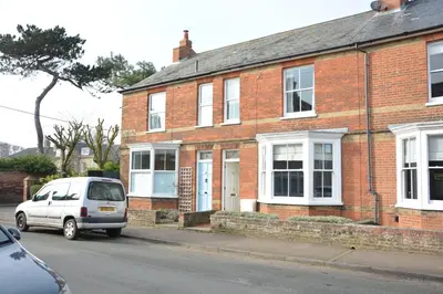 a van parked in front of a brick house at Lavender House, Aldeburgh in Aldeburgh