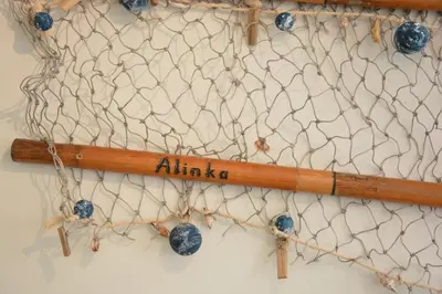 a group of ropes and blueberries on a wall at Alinka, Aldeburgh in Aldeburgh