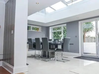 a dining room with a table and chairs at Little Wissett, Aldeburgh in Aldeburgh