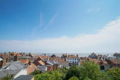 a view of a city with roofs and buildings at 10 Church Walk, Aldeburgh in Aldeburgh