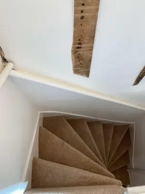 a stairwell in a house with a white ceiling at Quaint 2 bed Cottage in the Heart of Cambridge in Cambridge