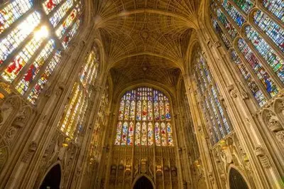 a large cathedral with many stained glass windows at Quaint 2 bed Cottage in the Heart of Cambridge in Cambridge