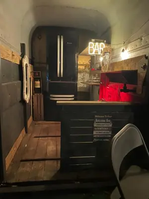 a restaurant with a bar sign in a room at Spacious Cabin with Private Hot Tub, and Private Pool, in 5 Acres - intimate Special stay For 2 Adults - plus 1 child under 2 and up to 2 dogs stay for free in Downham