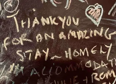 a chalk board with writing on it with a heart at Spacious Cabin with Private Hot Tub, and Private Pool, in 5 Acres - intimate Special stay For 2 Adults - plus 1 child under 2 and up to 2 dogs stay for free in Downham