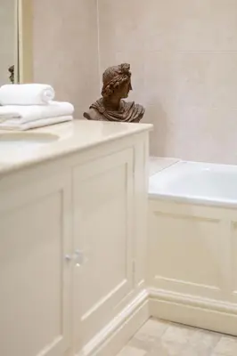 a statue of a bust sitting on a counter in a bathroom at The Crown, Bildeston in Bildeston