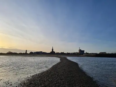a view of the shore of a body of water at Wellie Stern in Harwich