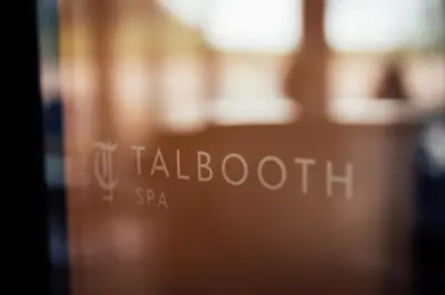 a glass door with the words talbotitis spa on it at Talbooth House & Spa in Dedham