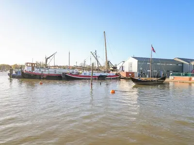 a group of boats docked in a body of water at The Penthouse in Woodbridge
