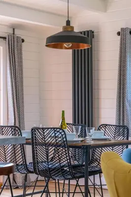 a dining room with a table and chairs at 2 Bed in Stradbroke oc-wopl in Stradbroke