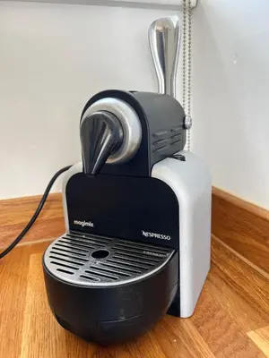 a black and white toaster sitting on the floor at Cosy Coastal 2-Bedroom Cottage with Hot Tub and Log Burner in West Mersea