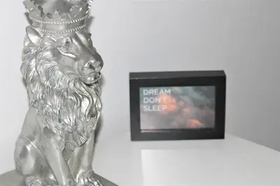 a statue of a horse next to a picture frame at Lovely Modern Apartment Close to Town Centre in Lexden