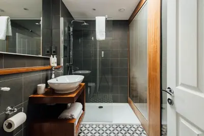 a bathroom with a sink and a shower at The Fox at Willian in Letchworth