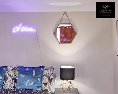 a room with a bed and a sign on the wall at Spacious 3 Bedroom and 2 Bathroom in Southend-on-Sea By Artisan Stays I Weekly or Monthly Stay Offer I Free Parking I Sleeps 7 in Southend-on-Sea