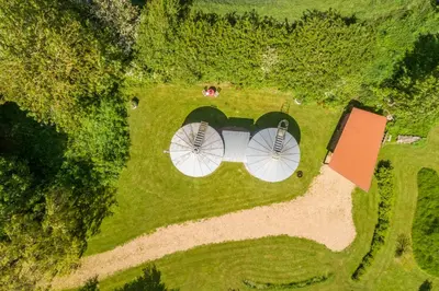 an overhead view of a windmill in a field at Extraordinarily converted grain stores - The Silos in Ipswich