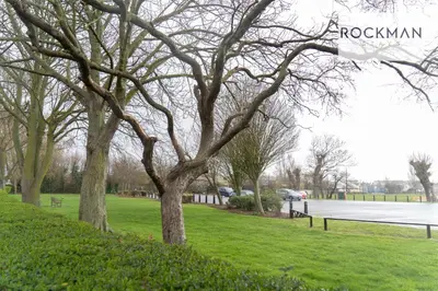 a group of trees in a park with a street at 5 Bed Apartment Close To Beach with Off-street parking - Perfect for Contractors - Fast Wi-Fi - Close to beach in Southend-on-Sea