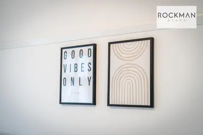 two framed prints on a wall in a room at 5 Bed Apartment Close To Beach with Off-street parking - Perfect for Contractors - Fast Wi-Fi - Close to beach in Southend-on-Sea