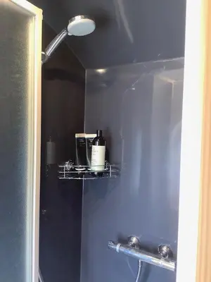 a bathroom with a shelf with a appliance on it at SkyFall in Grundisburgh