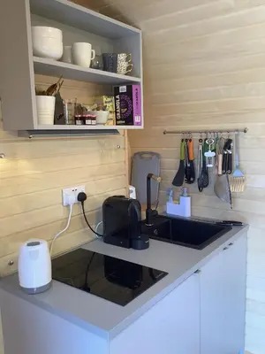 a kitchen with a sink and a counter top at SkyFall in Grundisburgh