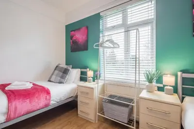 a bedroom with a bed and a window at The Modern Cambridge Studio 6 in Cambridge
