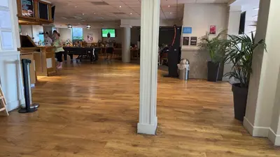 a hallway with a column in the middle of a building at Freedom House in Clacton-on-Sea