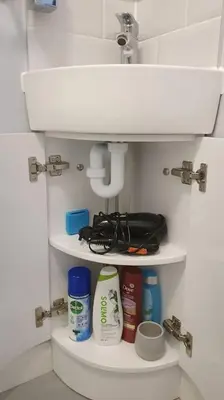 a bathroom with a sink and toiletries at Self-contained annex with private entrance, double bed, kitchen, bathroom, free car park - Near Cambridge, Duxford Air Museum and Addenbrooke's Hospital in Cambridge