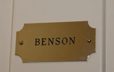 a sign with the wordbenition on a wall at The Mill B&B in Thetford
