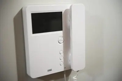 a nintendo wii game system sitting on a table at S/KING BED ONE BEDROOM FLAT in Brentwood