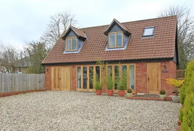 a detached house with a driveway in front of it at 2 Bed in Sudbury oc-clo in Sudbury