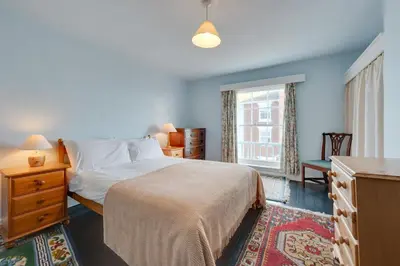 a bedroom with a bed and a dresser and a window at 3 Bed in Aldeburgh oc-marg in Aldeburgh