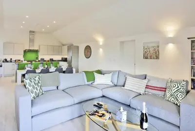 a living room with a couch and a table at 3 Bed in Snape oc-2wadd in Snape