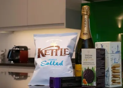 a bottle of wine and a bag of kite healthy satiated food at 3 Bed in Snape oc-2wadd in Snape