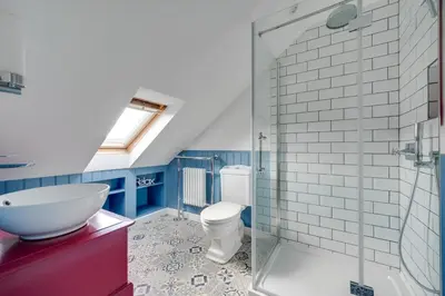 a bathroom with a toilet and a sink and a shower at 4 Bed in Halesworth oc-5river in Halesworth