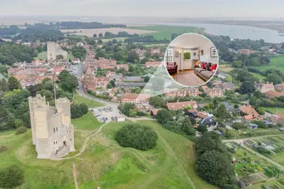 an aerial view of a castle and a house at 2 Bed in Orford oc-sfcto in Orford